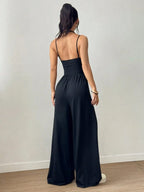 Dames Casual Effen Kleur Plooien Losse Rechte Jumpsuit A-lijn Backless Halter Hals Slanke Cami Jumpsuit Streetwear 2025