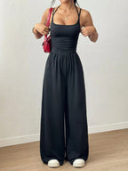 Dames Casual Effen Kleur Plooien Losse Rechte Jumpsuit A-lijn Backless Halter Hals Slanke Cami Jumpsuit Streetwear 2025