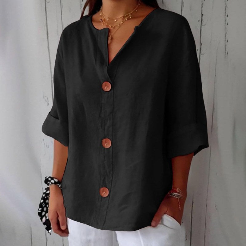 Elegant blus med v-ringning och knappstängning - Black