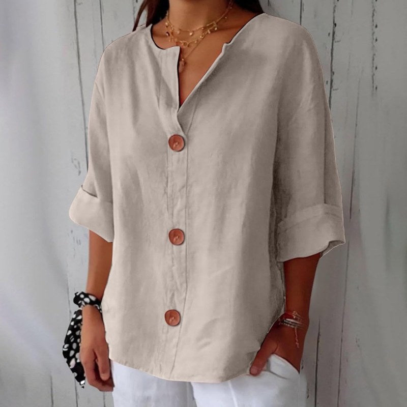 Elegant blus med v-ringning och knappstängning - Cream