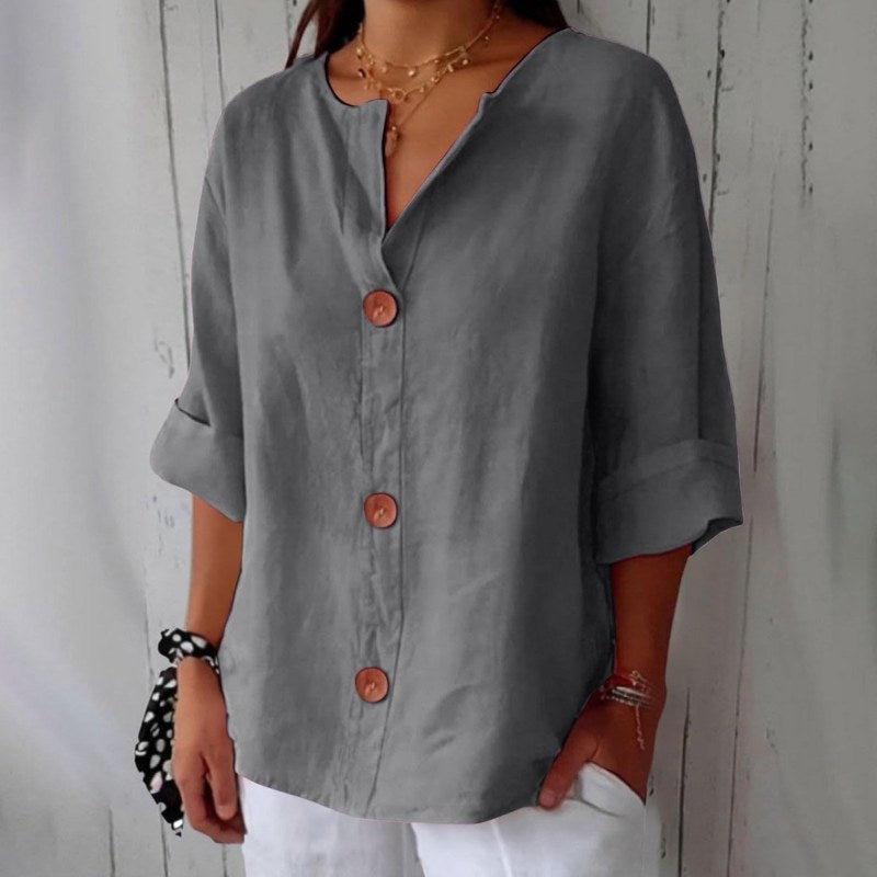 Elegant blus med v-ringning och knappstängning - Grey