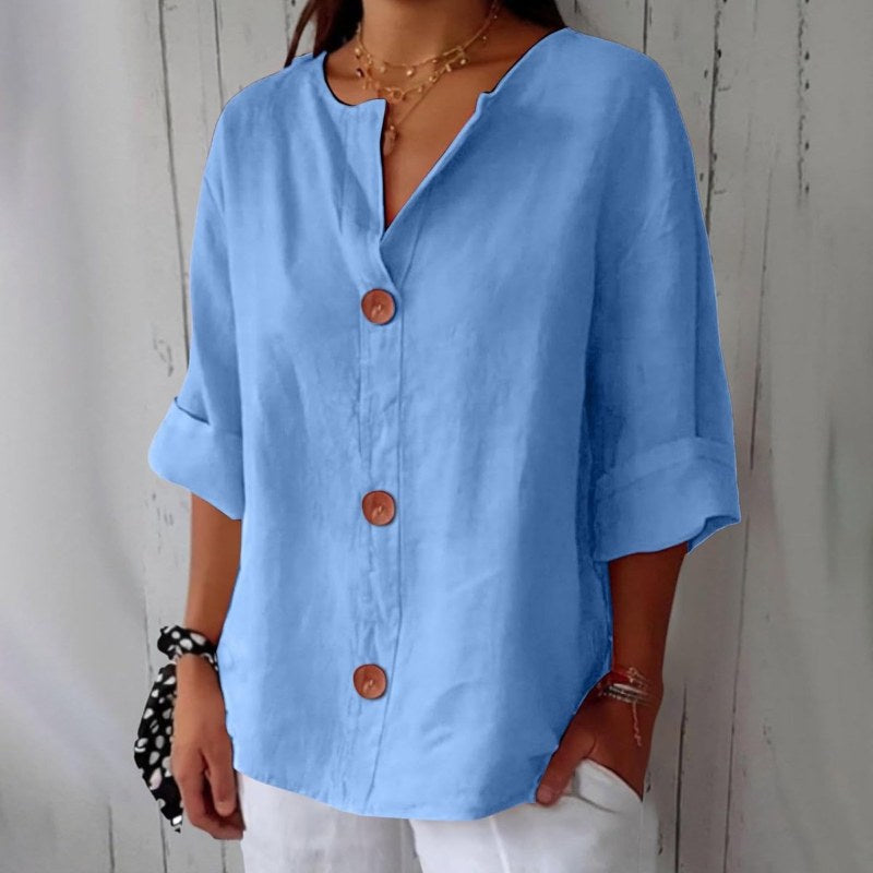Elegant blus med v-ringning och knappstängning - Light Blue