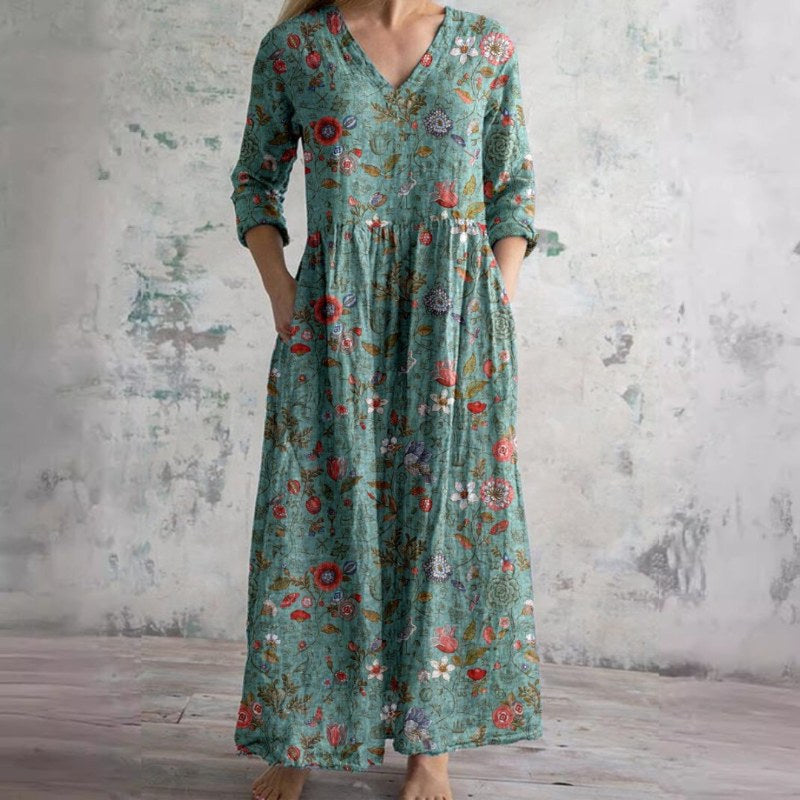 Elegant v-ringad maxiklänning med blommönster och långa ärmar - Beige