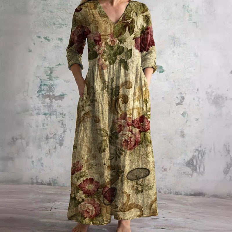 Elegant v-ringad maxiklänning med blommönster och långa ärmar - Brown