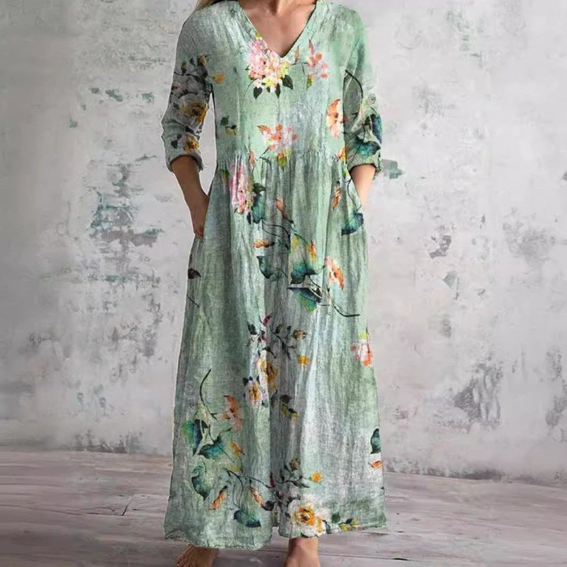 Elegant v-ringad maxiklänning med blommönster och långa ärmar - Green
