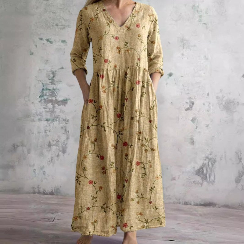 Elegant v-ringad maxiklänning med blommönster och långa ärmar - Yellow