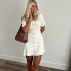 Witte elegante gebreide mini-jurk voor vrouwen metalen knop sexy slanke rib trui jurk vakantie feestoutfits herfst 2024 nieuw